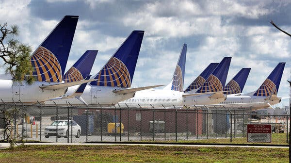 United Airlines planes are parked at Orlando International Airport, in a Tuesday, April 7, 2020.